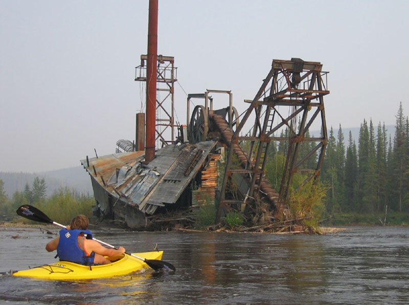 Kayaking to the Cowden gold dredge at Chicken, Alaska