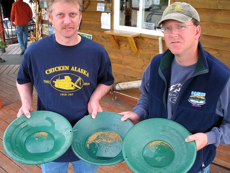 Miners show off the gold they panned out at Chicken, Alaska